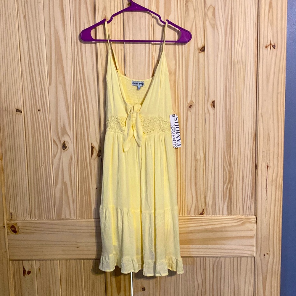 Yellow dress beautiful for spring it’s a large and it is brand new